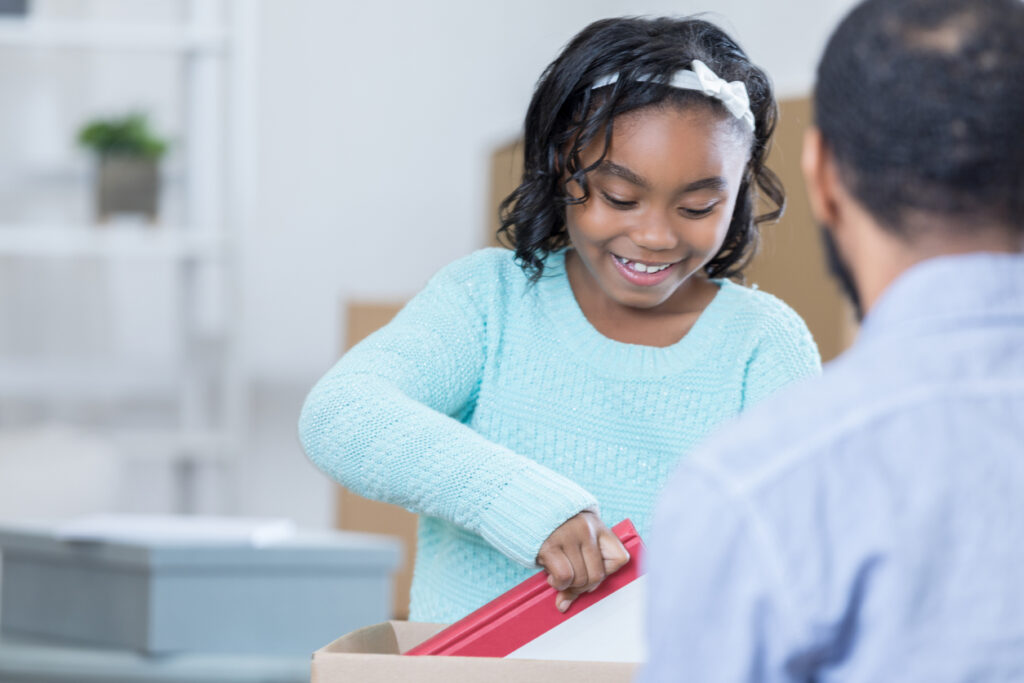 Young child with adult of a different race
